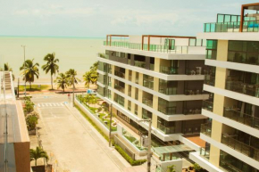 Flat novíssimo a 40 metros do mar